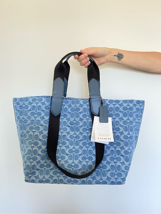 Coach Handbags - Coach Light Blue Denim Signature Tote with Black Straps